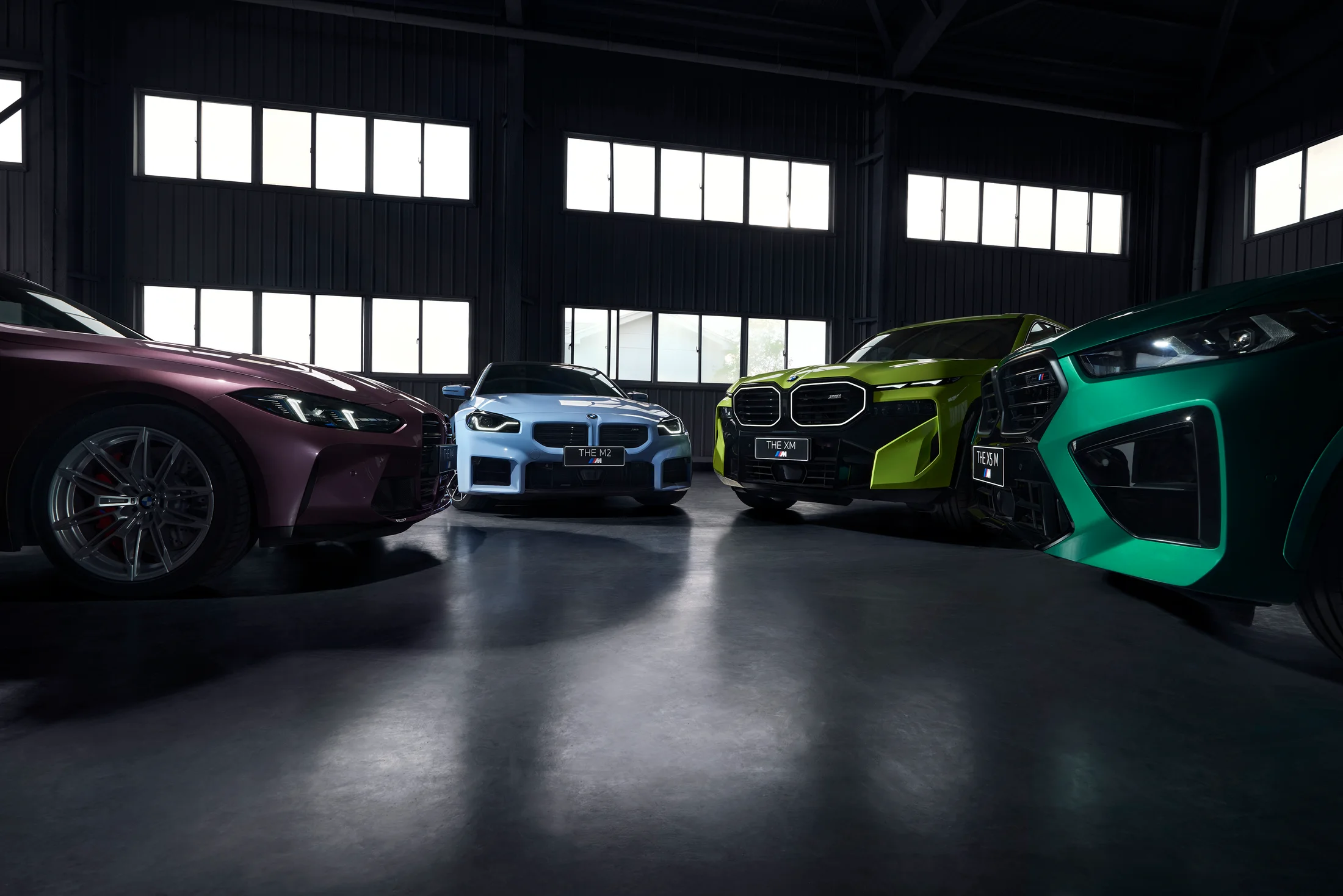 BMW M lineup in a garage
